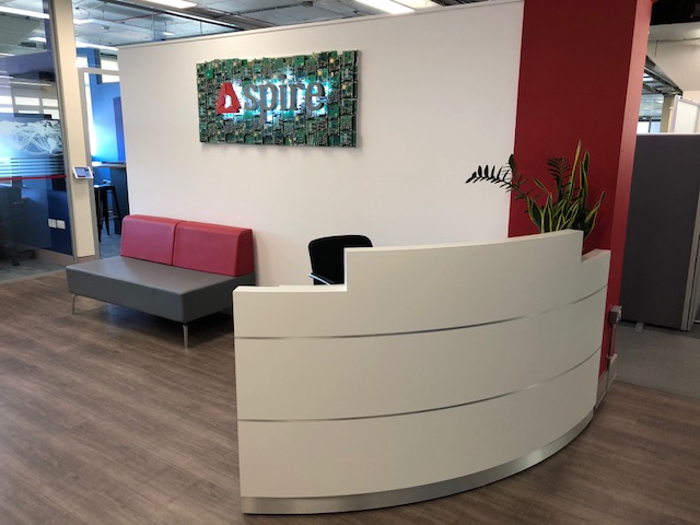 Modern reception desk and soft seating
